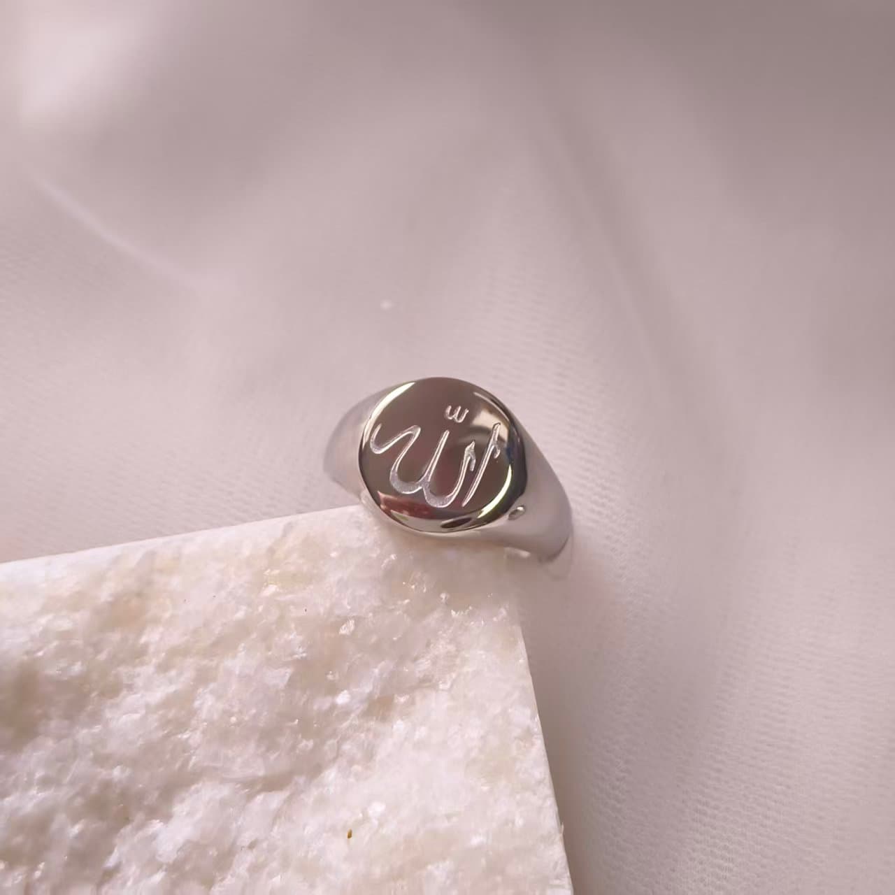 Stainless steel signet ring engraved with the name of Allah in Arabic calligraphy